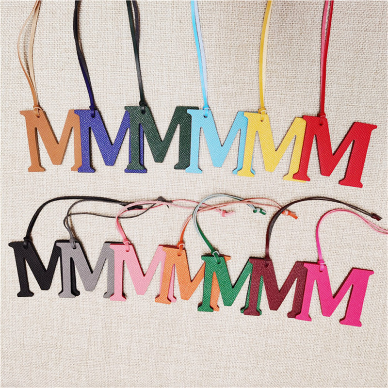 XMESSUN 新しい英語文字 M チャーム高級本物の天然皮 - Monogram Keychain Leather のレビューと価格